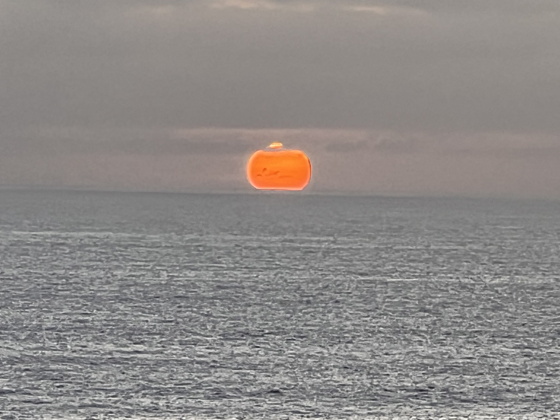 Sun setting over the ocean